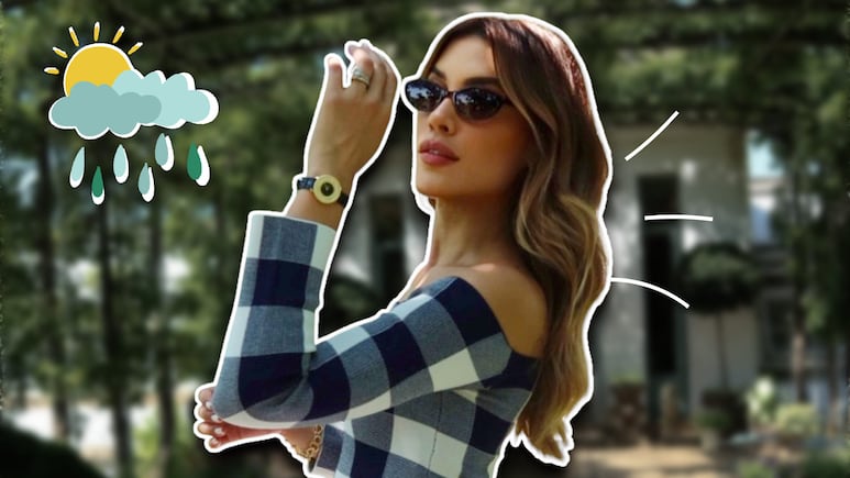 Michelle Salas con gabardina y gorra beige en un día lluvioso de verano