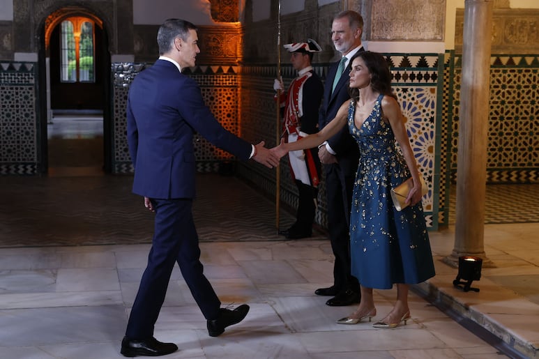 los reyes de España en la conferencia de Sevilla